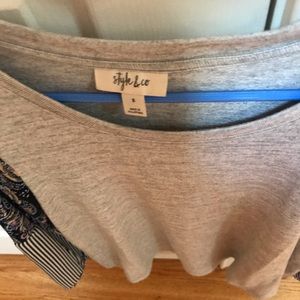 Soft bodice with silky sleeves.